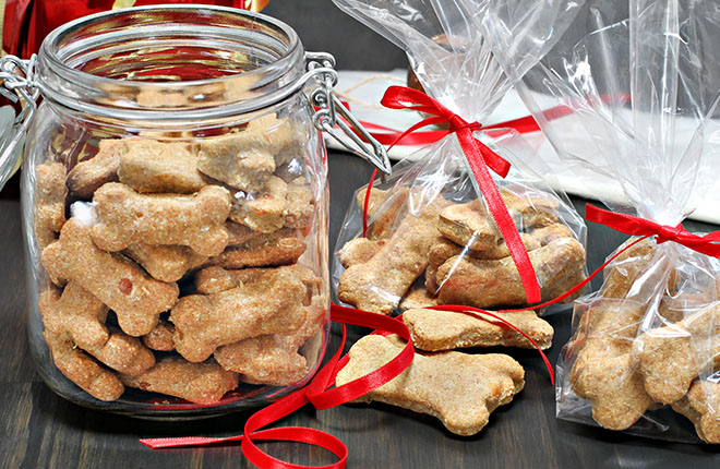 Homemade dog treats in jar and gift bags.